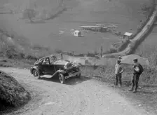 Kitty Brunell driving a 1930 2-seater Ford Model A, 1931. Artist: Bill Brunell
