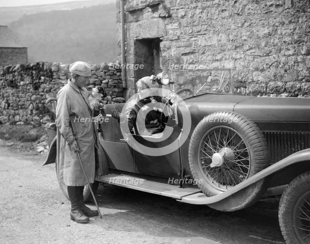 Kitty Brunell in a MG 18/80 open 4-seater, c1930(?). Artist: Bill Brunell.