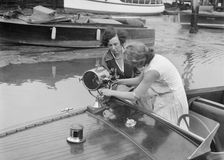 Kitty Brunell in a British Power Boat Company launch, Hythe, Hampshire, 1927. Artist: Bill Brunell