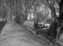 Kitty Brunell in a Talbot 75 4-door saloon, c1930. Artist: Bill Brunell