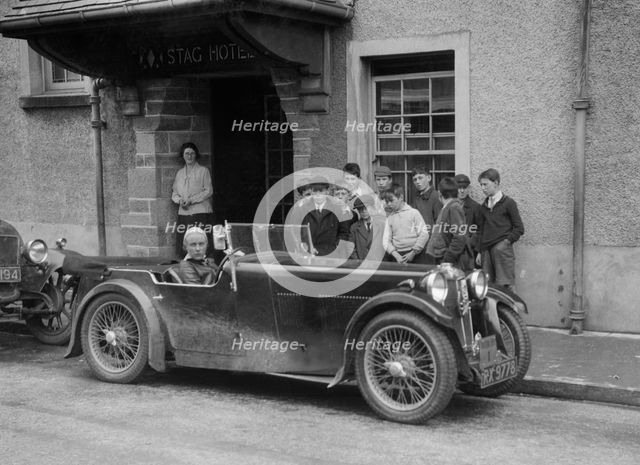Kitty Brunell in her MG Magna outside the Stag Hotel, Edinburgh, RSAC Scottish Rally, 1932. Artist: Bill Brunell.