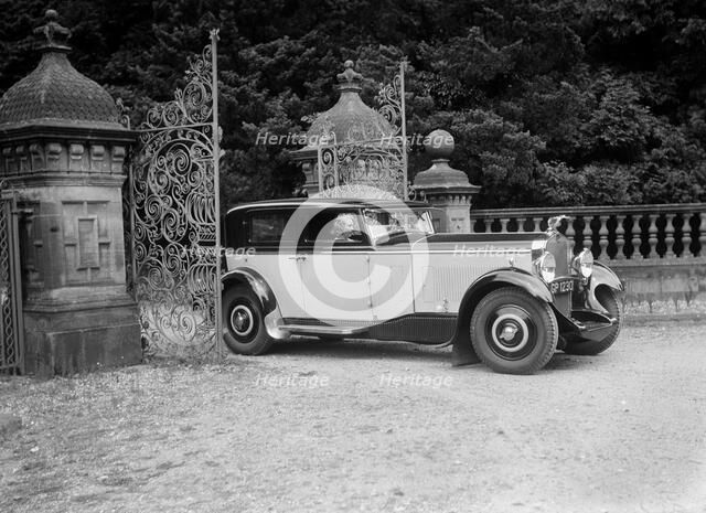 Kitty Brunell road testing a 1931 Delage D8, Wykehurst Place, Bolney, Sussex. Artist: Bill Brunell.