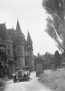 Kitty Brunell road testing a 1931 Delage D8, Wykehurst Place, Bolney, Sussex. Artist: Bill Brunell