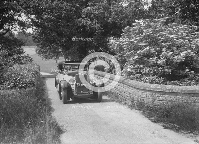 Kitty Brunell road testing a 1931 Delage D8. Artist: Bill Brunell.