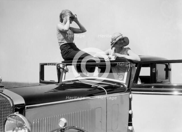 Kitty Brunell road testing a 1931 Delage D8. Artist: Bill Brunell.