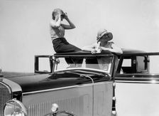 Kitty Brunell road testing a 1931 Delage D8. Artist: Bill Brunell