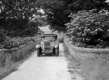 Kitty Brunell road testing a 1931 Delage D8. Artist: Bill Brunell