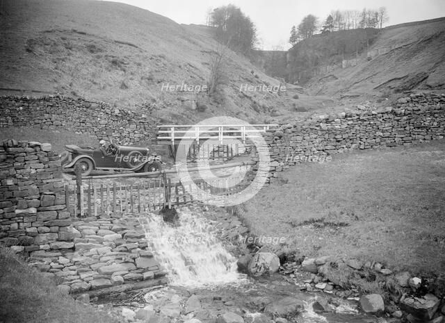 Kitty Brunell road testing a MG 18/80, Tan Hill, Yorkshire, April 1931. Artist: Bill Brunell.