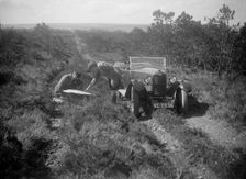 Kitty Brunell road testing a Riley 9 WD tourer, c1930. Artist: Bill Brunell