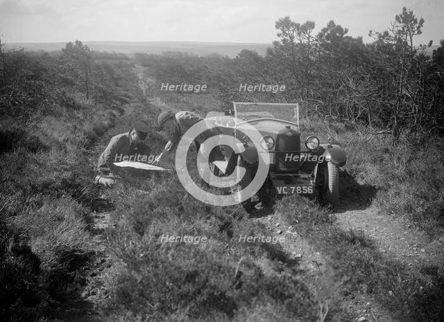 Kitty Brunell road testing a Riley 9 WD tourer, c1930. Artist: Bill Brunell.