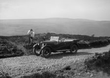 Kitty Brunell road testing a Riley 9 WD tourer, c1930. Artist: Bill Brunell