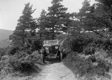Kitty Brunell road testing a Riley 9 WD tourer, c1930. Artist: Bill Brunell