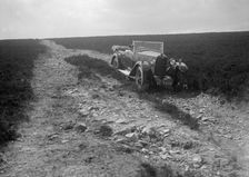 Kitty Brunell road testing a Riley 9 WD tourer, c1930. Artist: Bill Brunell
