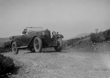 Kitty Brunell road testing a Riley 9 WD tourer, c1930. Artist: Bill Brunell