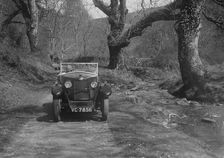 Kitty Brunell road testing a Riley 9 WD tourer, c1930. Artist: Bill Brunell