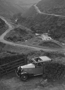 Kitty Brunell road testing a Standard Little Twelve saloon, c1932. Artist: Bill Brunell