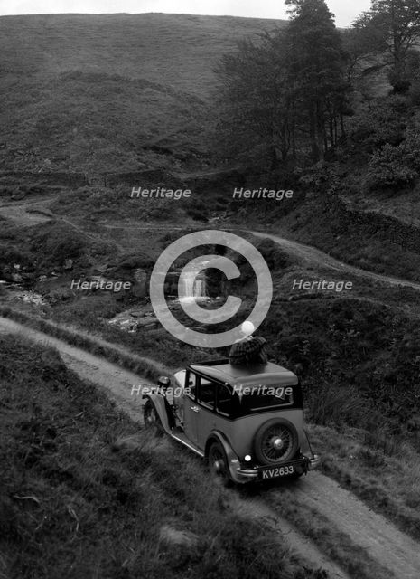 Kitty Brunell road testing a Standard Little Twelve saloon, c1932. Artist: Bill Brunell.