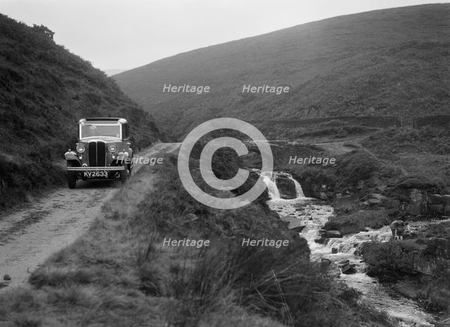 Kitty Brunell road testing a Standard Little Twelve saloon, c1932. Artist: Bill Brunell.
