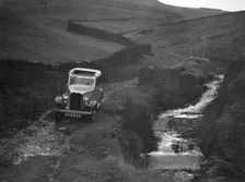 Kitty Brunell road testing a Standard Little Twelve saloon, c1932. Artist: Bill Brunell