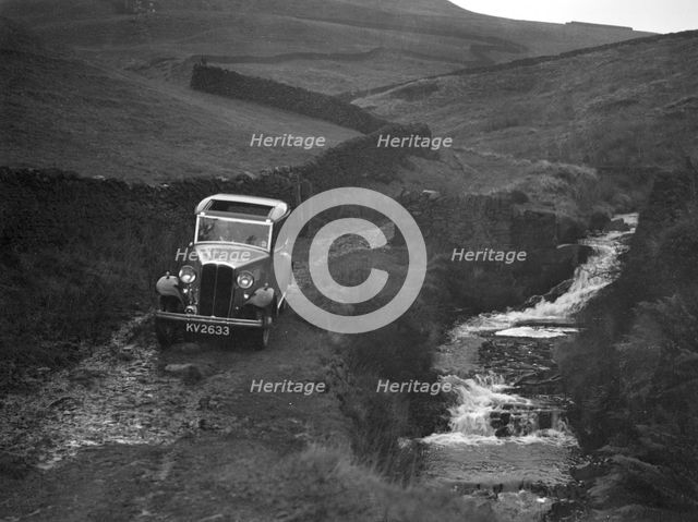 Kitty Brunell road testing a Standard Little Twelve saloon, c1932. Artist: Bill Brunell.