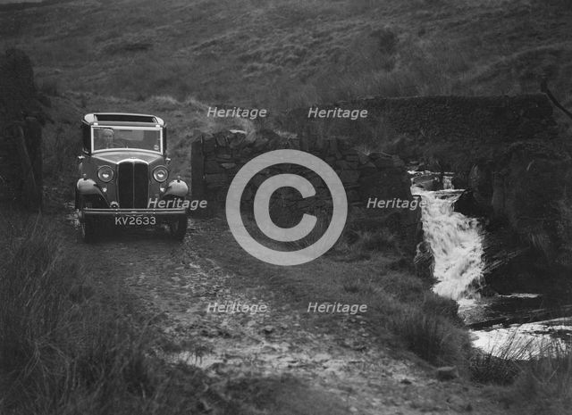 Kitty Brunell road testing a Standard Little Twelve saloon, c1932. Artist: Bill Brunell.