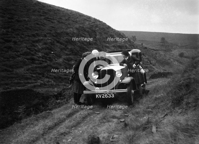 Kitty Brunell road testing a Standard Little Twelve saloon, c1932. Artist: Bill Brunell.