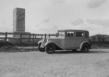 Kitty Brunell's Bianchi saloon beside the Cricket Monument, Hambledon, Hampshire, 1930s Artist: Bill Brunell