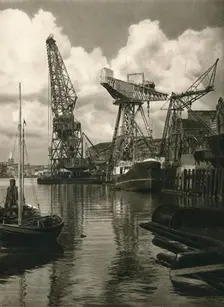 Kiel - Giant floating crane of the Germania Shipbuilding Yards 1931. Artist: Kurt Hielscher