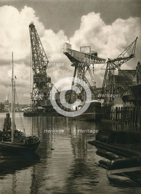 'Kiel - Giant floating crane of the Germania Shipbuilding Yards', 1931. Artist: Kurt Hielscher.