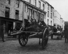 Killarney - 3 Irish women going to a funeral in a horse-drawn cart, (1899?). Creator: Frances Benjamin Johnston