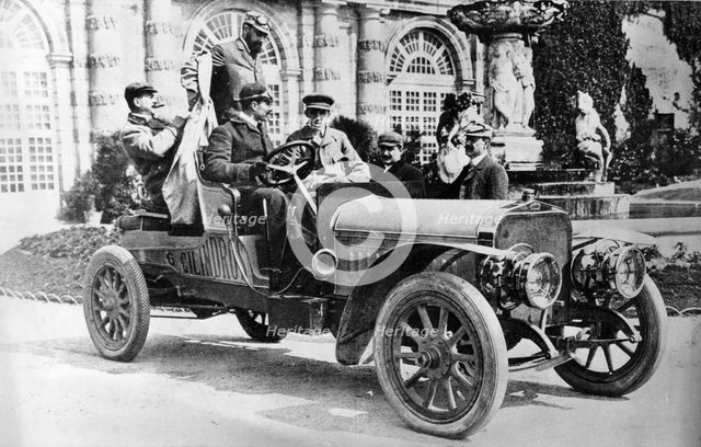 King Alfonso XIII in a Hispano-Suiza car, palace of La Granja, Segovia, Spain, c1907. Artist: Unknown