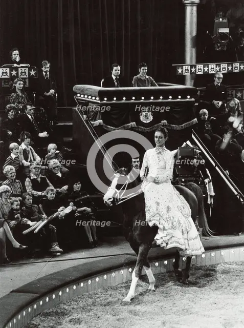 King Carl XVI Gustaf and Queen Silvia of Sweden attending the circus, 1977. Creator: Unknown.