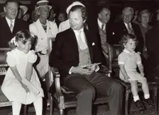 King Carl XVI Gustav of Sweden with Princess Victoria and Prince Carl Philip, 1982. Creator: Unknown