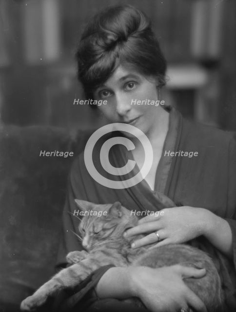 King, Daisy, Miss, with Buzzer the cat, portrait photograph, 1914 June. Creator: Arnold Genthe.