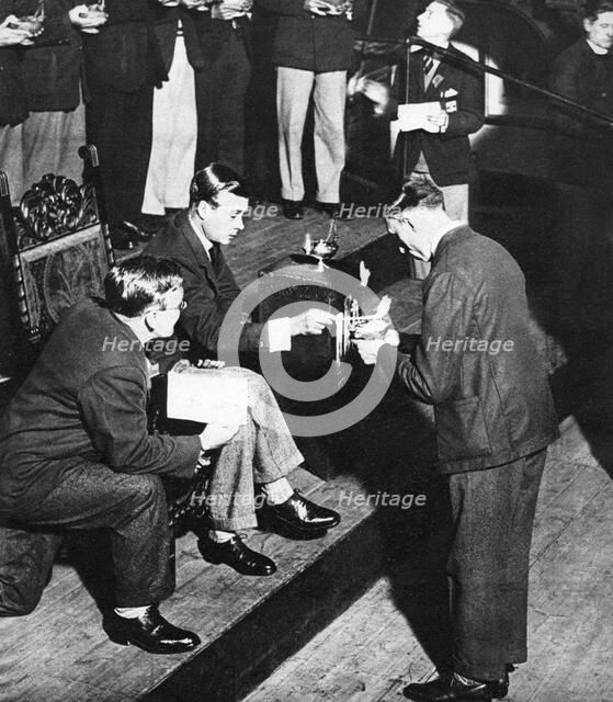 King Edward VIII as the patron of TOC H lighting lamps of remembrance, Westminster, 1936. Artist: Unknown
