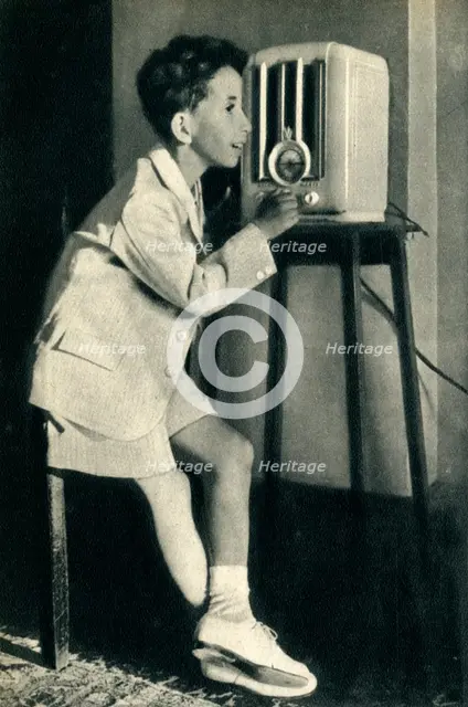 'King Faisal of Iraq listening to a broadcast prepared for his birthday by the BBC', 1942. Creator: Unknown.