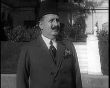 King Faud I Standing in Front of Steps, 1924. Creator: British Pathe Ltd