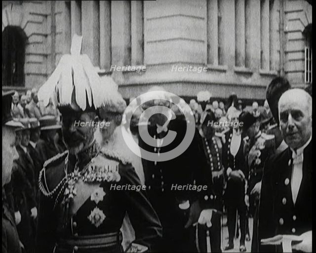 King George V Talking to a British Officer, Queen Mary Can Be Seen Behind Him, 1922. Creator: British Pathe Ltd.