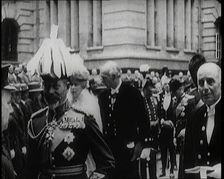 King George V Talking to a British Officer, Queen Mary Can Be Seen Behind Him, 1922. Creator: British Pathe Ltd