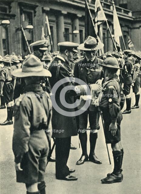 'King George V with Lord Baden-Powell Inspecting Boy Scouts, 1920', 1944. Creator: Unknown.
