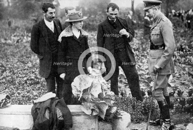 King George V admiring allotments on Clapham Common, London, c1910s-c1920s (1936). Artist: Unknown
