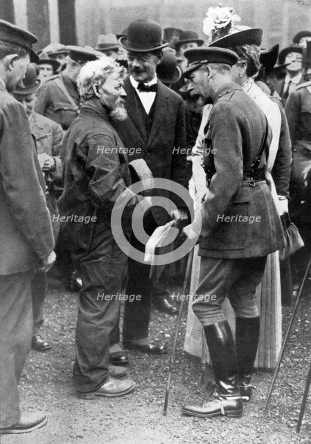 King George V and Queen Mary with a shipwright, Birkenhead, First World War, 1914-1918, (c1920). Artist: Unknown
