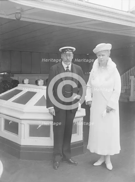 King George V and Queen Mary aboard 'HMY Victoria and Albert', 1933. Creator: Kirk & Sons of Cowes.