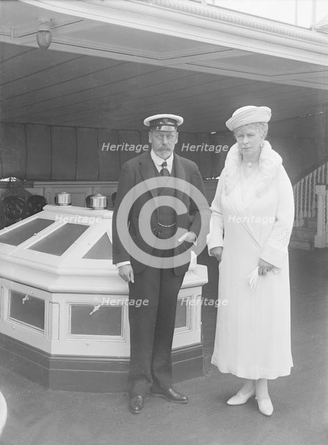 King George V and Queen Mary aboard 'HMY Victoria and Albert', 1933. Creator: Kirk & Sons of Cowes.
