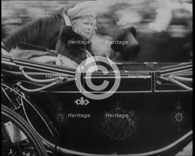 King George V and Queen Mary of Teck Returning to London in an Open Royal Coach, 1929. Creator: British Pathe Ltd.