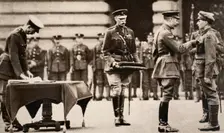 King George V awarding the Victoria Cross to Private Wilfred Edwards, 1917. Creator: Unknown