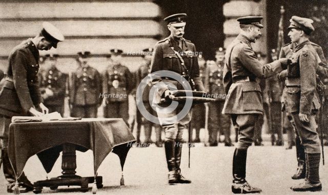 King George V awarding the Victoria Cross to Private Wilfred Edwards, 1917. Artist: Unknown