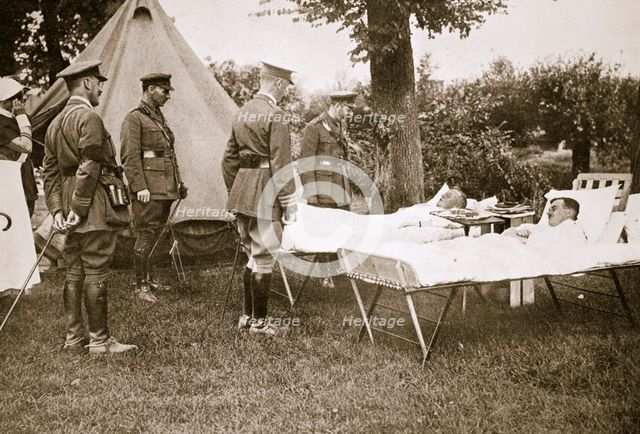King George V conversing with wounded officers, France, World War I, 1916. Artist: Unknown