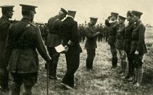 King George V decorates British personnel, Belgium, First World War, 1914-1918, (c1920). Creator: Unknown
