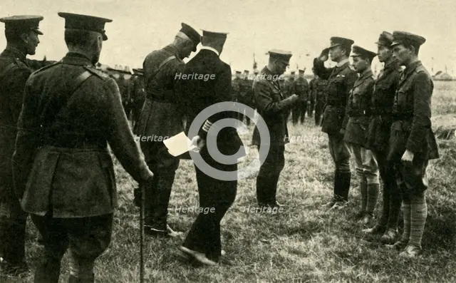 King George V decorates British personnel, Belgium, First World War, 1914-1918, (c1920). Creator: Unknown.